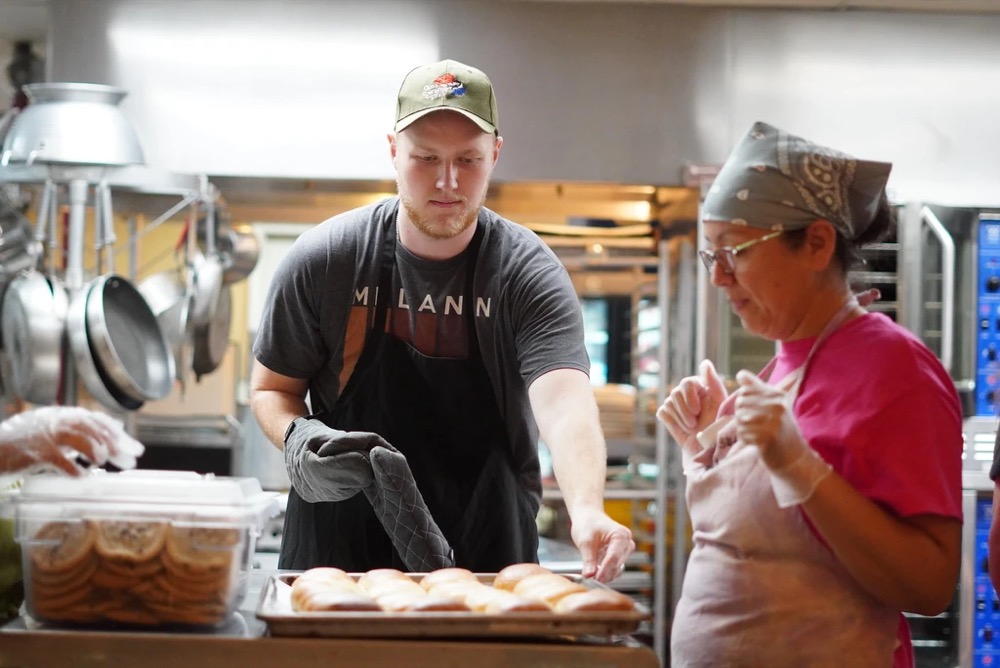 camp kitchen staff baking